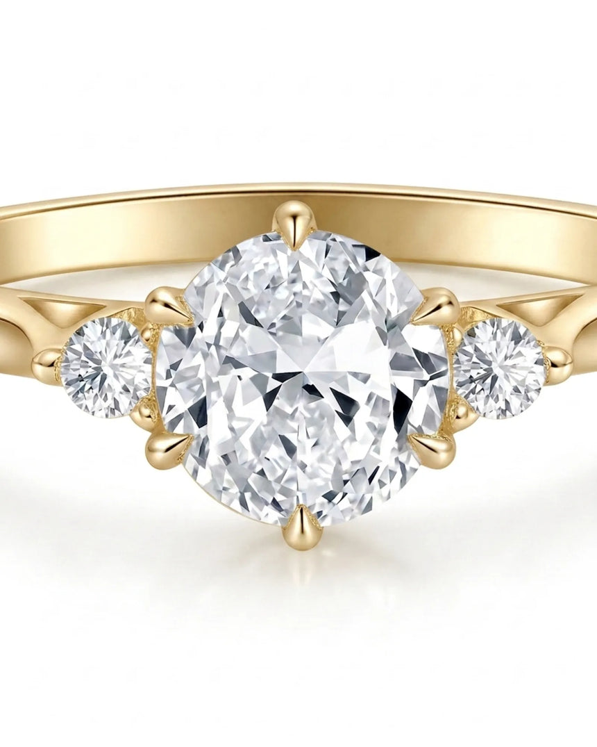 Round three stone moissanite engagement ring for a warm refined proposal in yellow gold | SARATTI