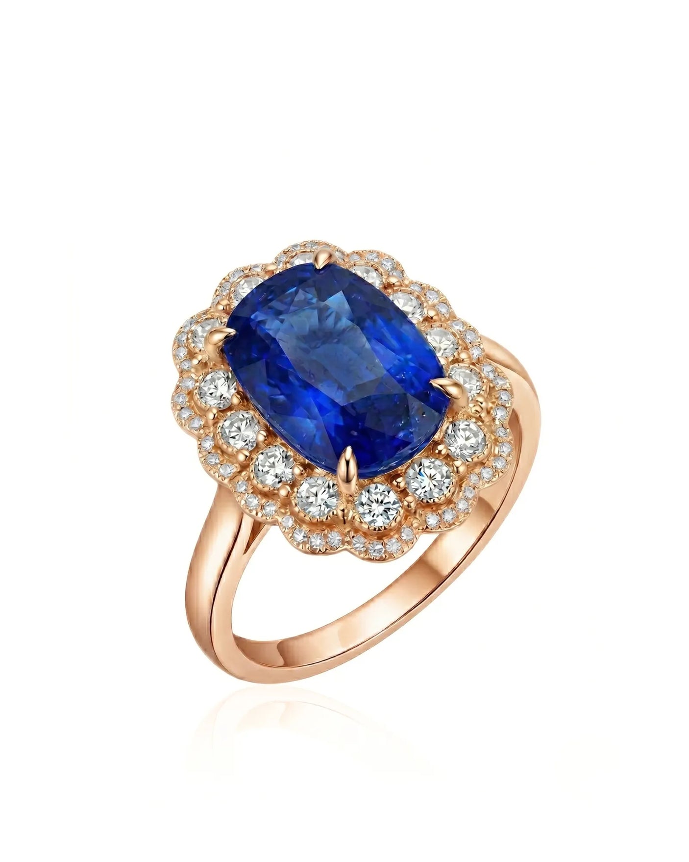 Royal blue cushion sapphire ring with scalloped diamond halo in 18K rose gold | SARATTI