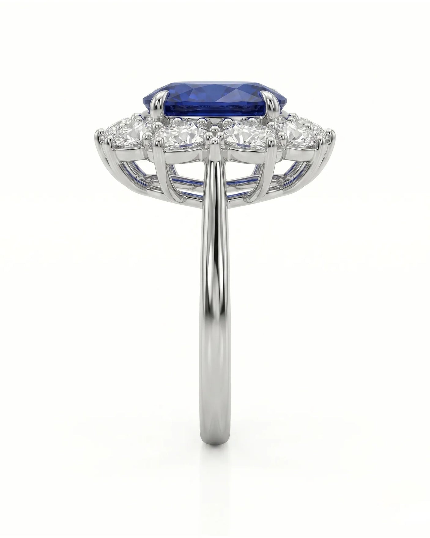 Royal blue oval sapphire ring with brilliant diamond floral frame in platinum | SARATTI