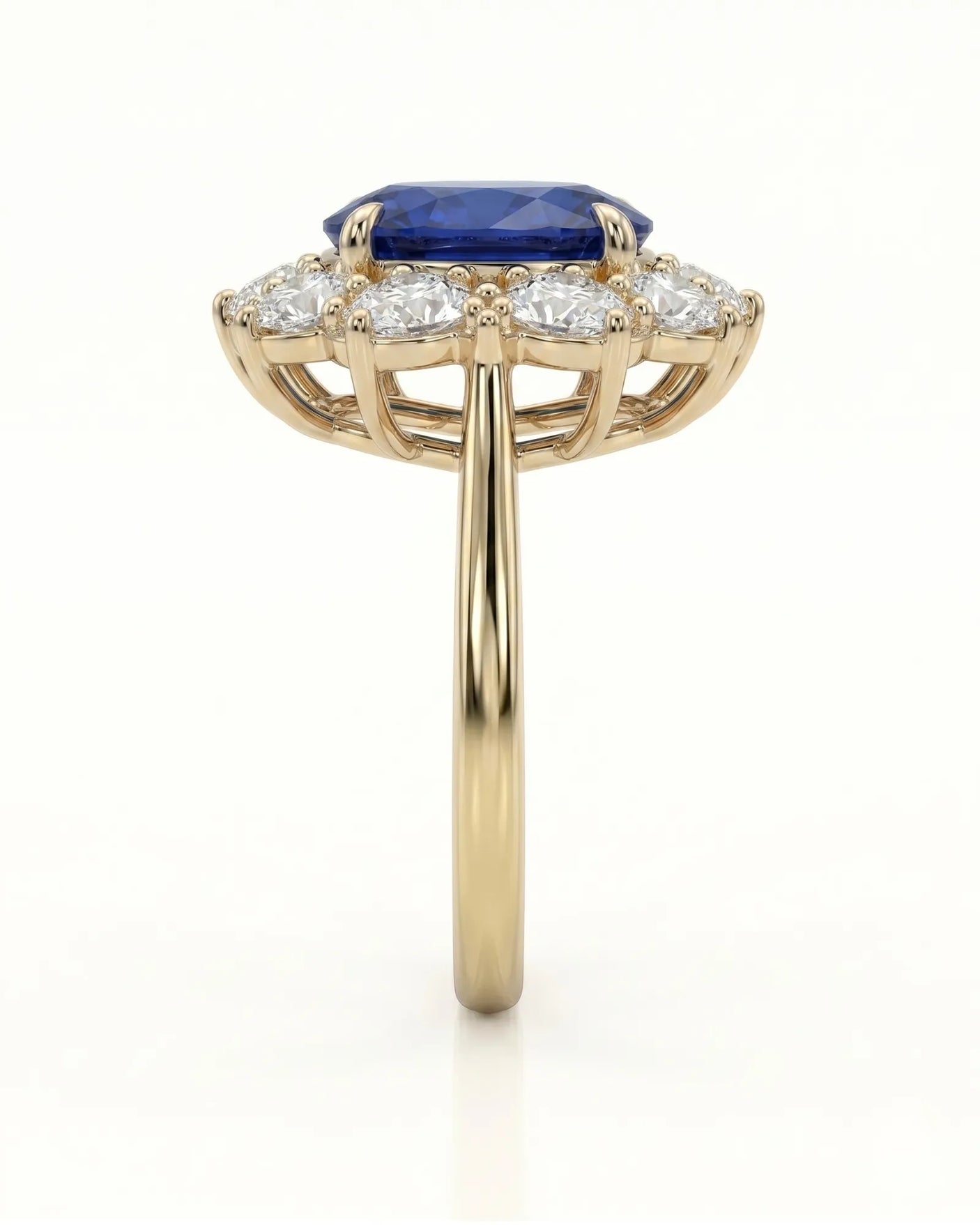 
Royal blue oval sapphire ring with brilliant diamond halo in 18K yellow gold - SARATTI
