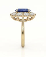 
Royal blue oval sapphire ring with brilliant diamond halo in 18K yellow gold - SARATTI
