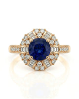 Royal blue round sapphire ring with mixed diamond halo in 18K yellow gold | SARATTI