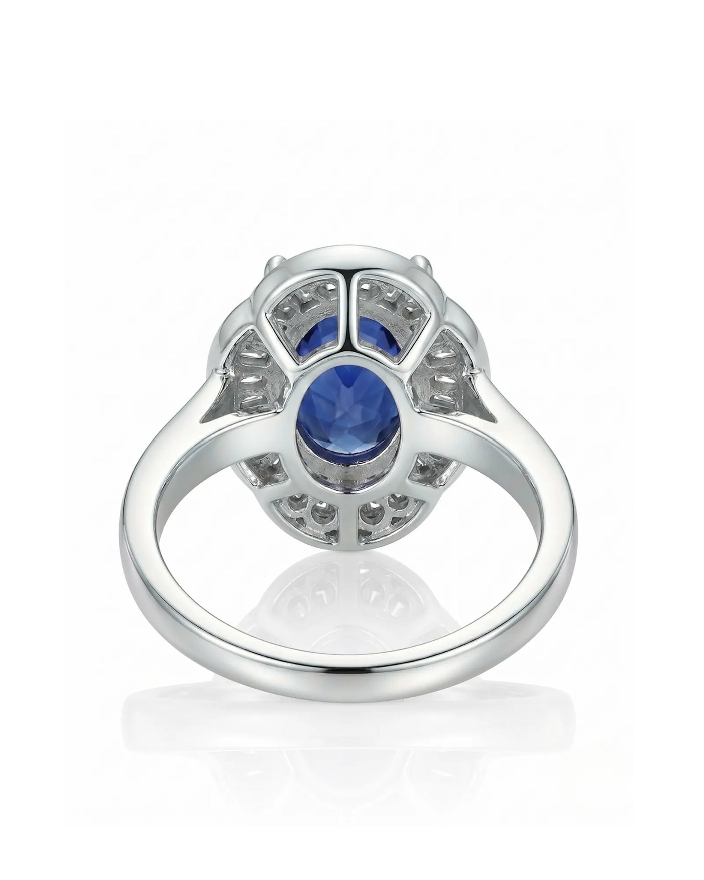 Royal blue sapphire engagement ring with diamond halo for vintage proposals in 18K white gold | SARATTI