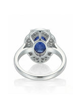 Royal blue sapphire engagement ring with diamond halo for vintage proposals in 18K white gold | SARATTI