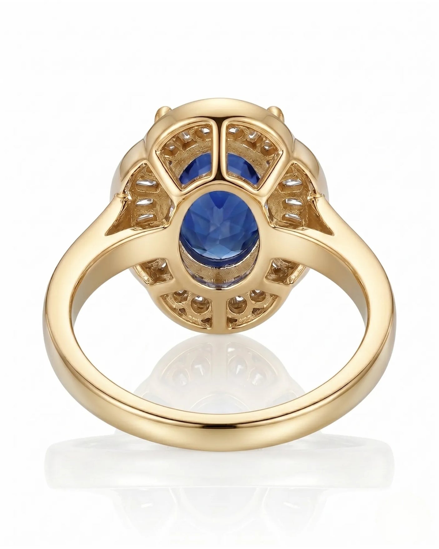 Royal blue sapphire engagement ring with diamond halo for vintage proposals in 18K yellow gold | SARATTI