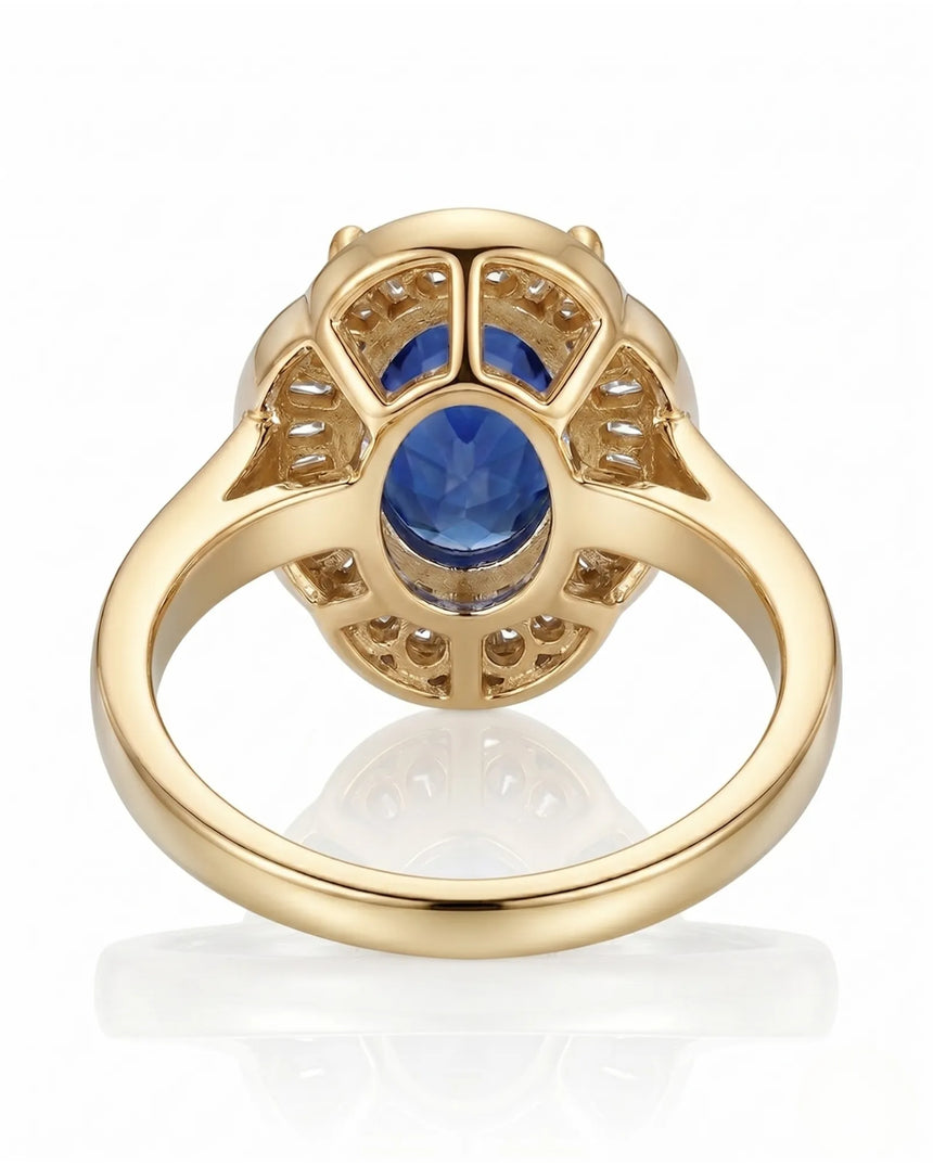 Royal blue sapphire engagement ring with diamond halo for vintage proposals in 18K yellow gold | SARATTI
