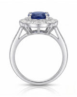Royal blue sapphire engagement ring with diamond halo for vintage proposals in platinum | SARATTI