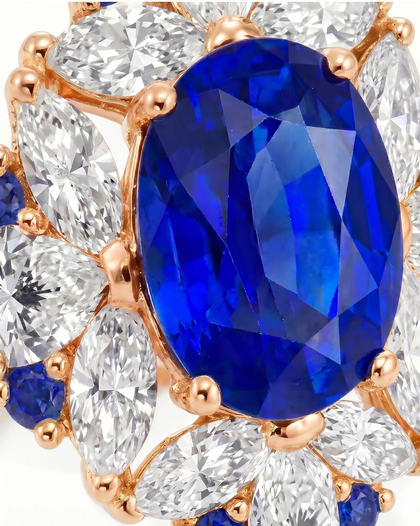 Royal sapphire ring with pear marquise and round diamond halo in 18K rose gold | SARATTI