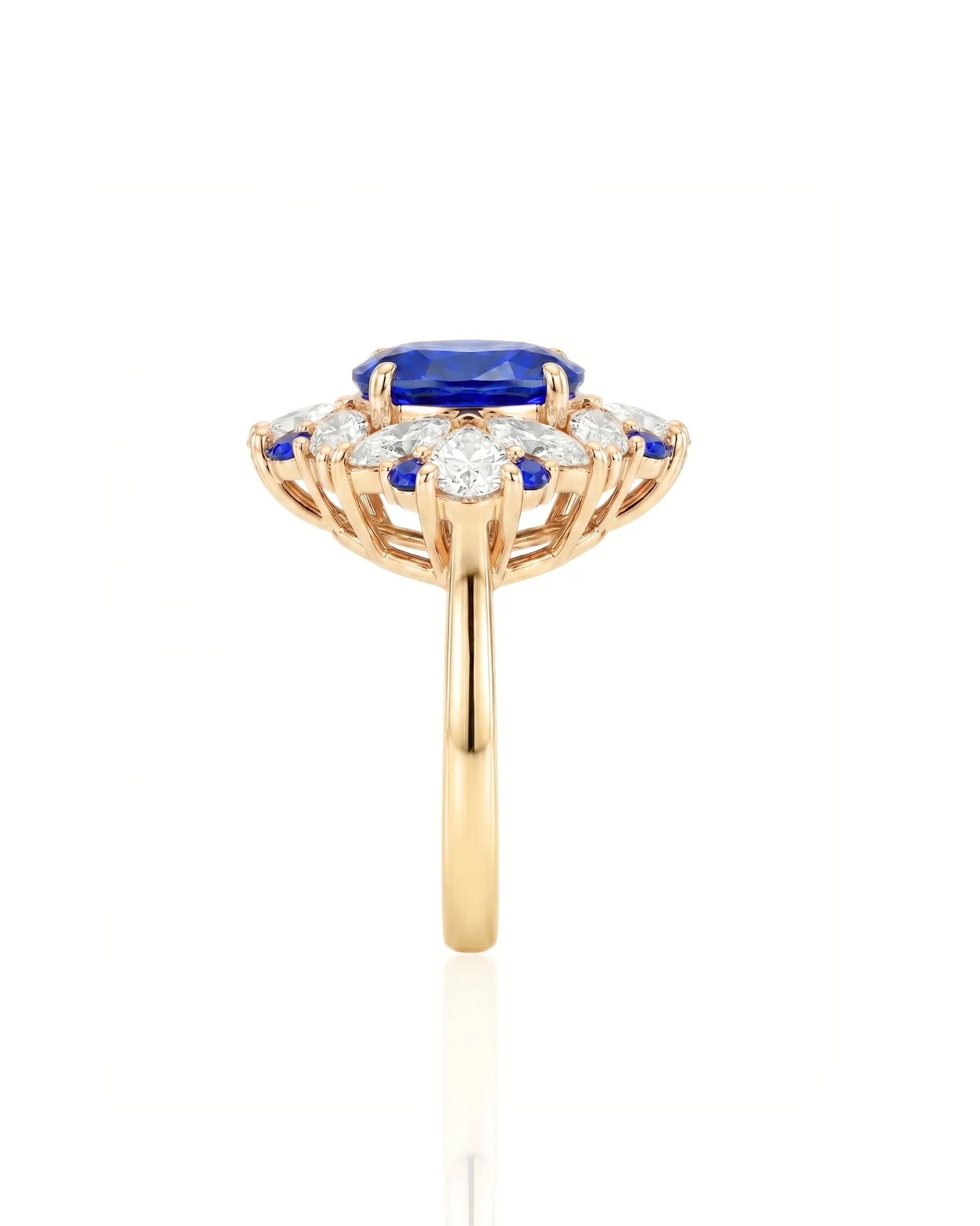Royal sapphire ring with pear marquise and round diamond halo in 18K yellow gold | SARATTI