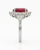 Rubellite tourmaline engagement ring in white gold with sparkling diamond halo | SARATTI