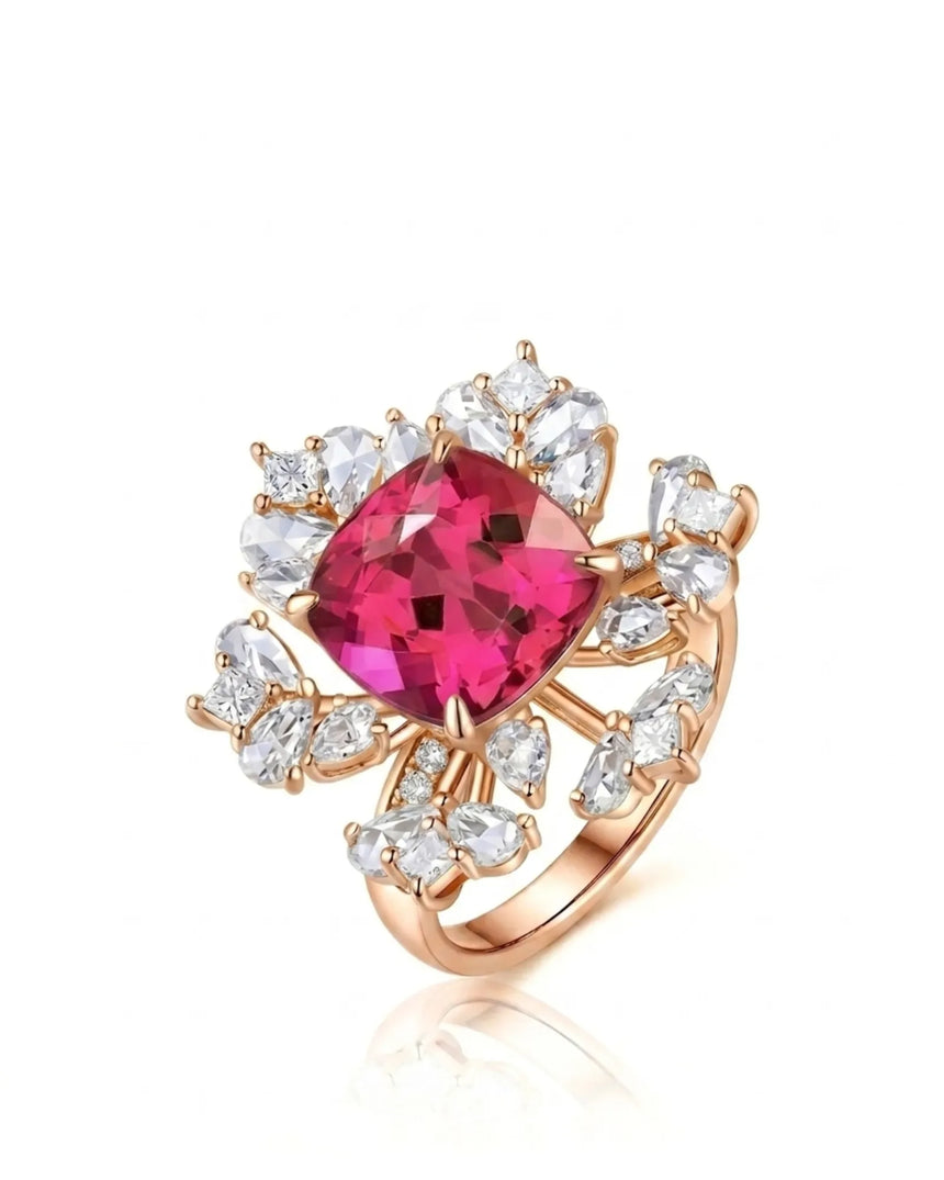 Rubellite tourmaline ring with cushion center stone and diamond floral halo in 18K rose gold | SARATTI