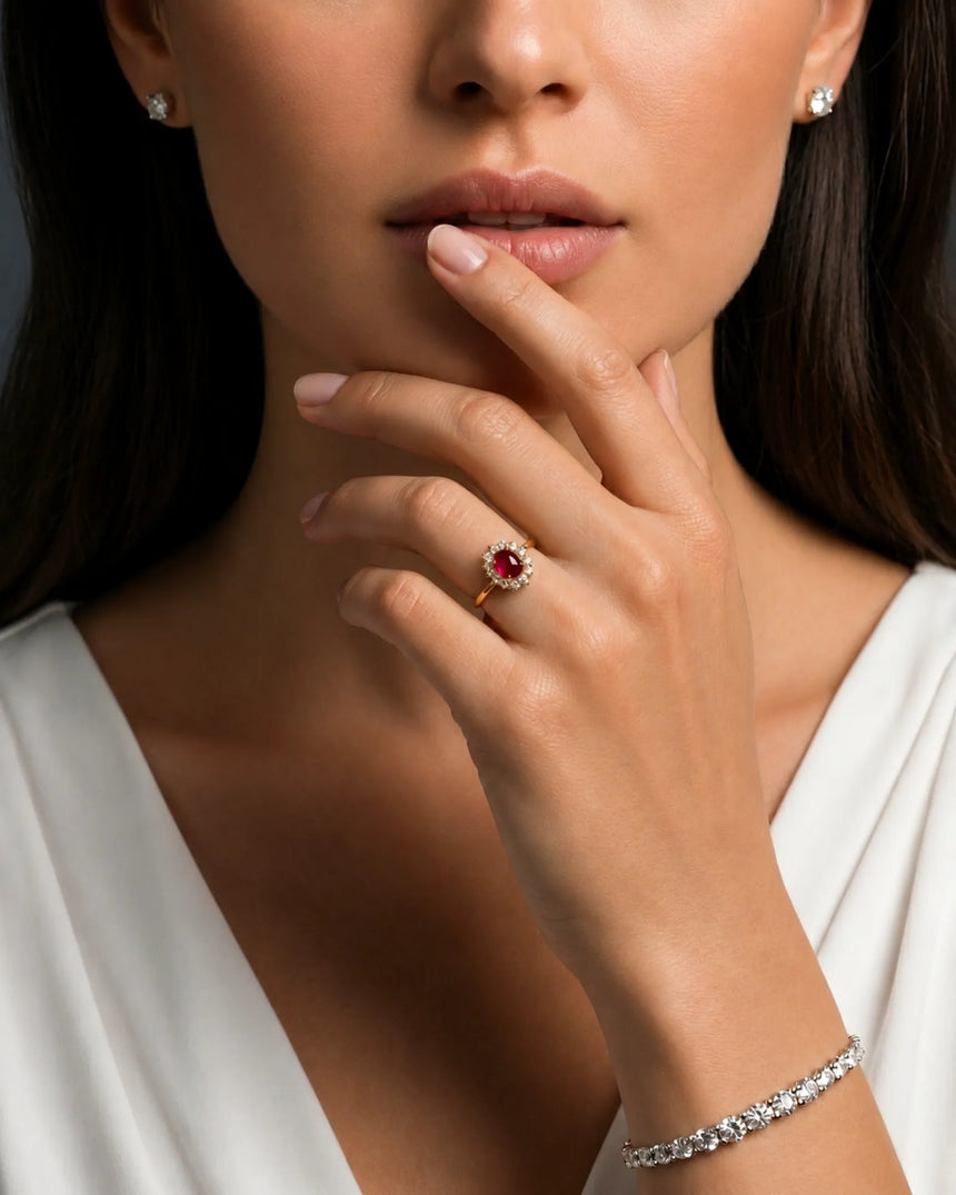 Ruby and diamond anniversary ring with oval center stone in 18K rose gold | SARATTI