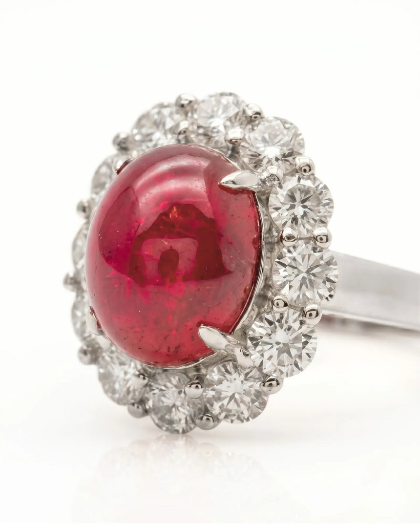 Ruby and diamond anniversary ring with oval center stone in elegant platinum | SARATTI
