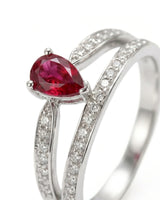 Ruby and diamond gift ring with graceful split shank in 18K white gold | SARATTI