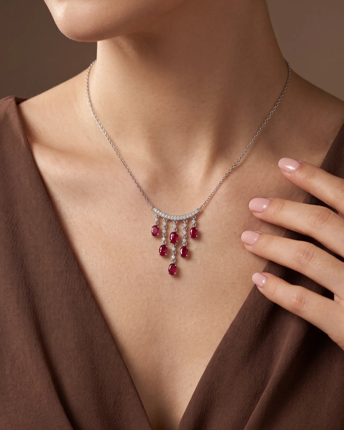 Ruby cascade necklace with graduated hanging tassels, curved diamond bar and refined platinum construction | SARATTI