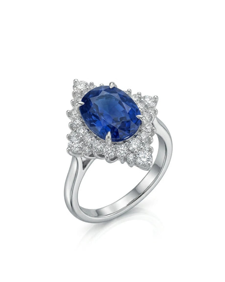 SERAPHINE cornflower blue sapphire diamond ring with oval centre stone and graduated platinum diamond surround | SARATTI