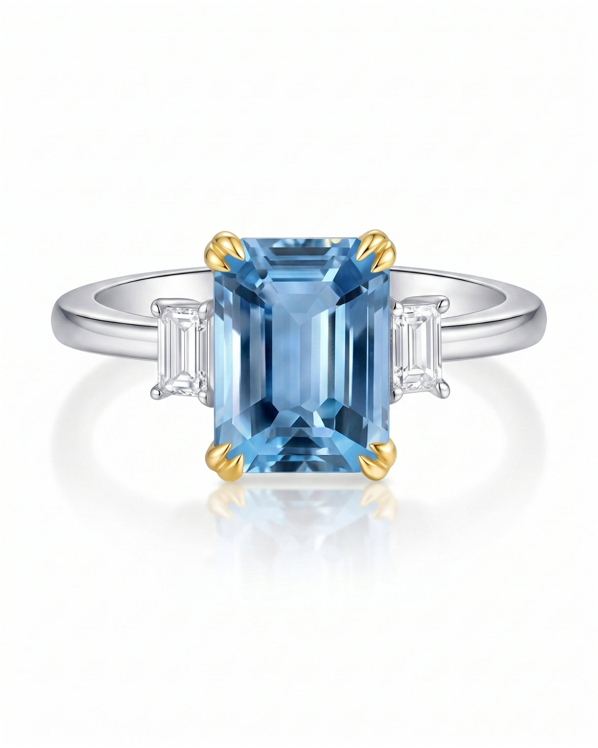 Trilune emerald-cut Aquamarine diamond three-stone ring setting in two-tone gold, profile view | SARATTI