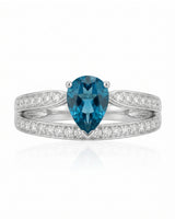 Santa Maria blue aquamarine ring with pear shaped center stone in Platinum | SARATTI