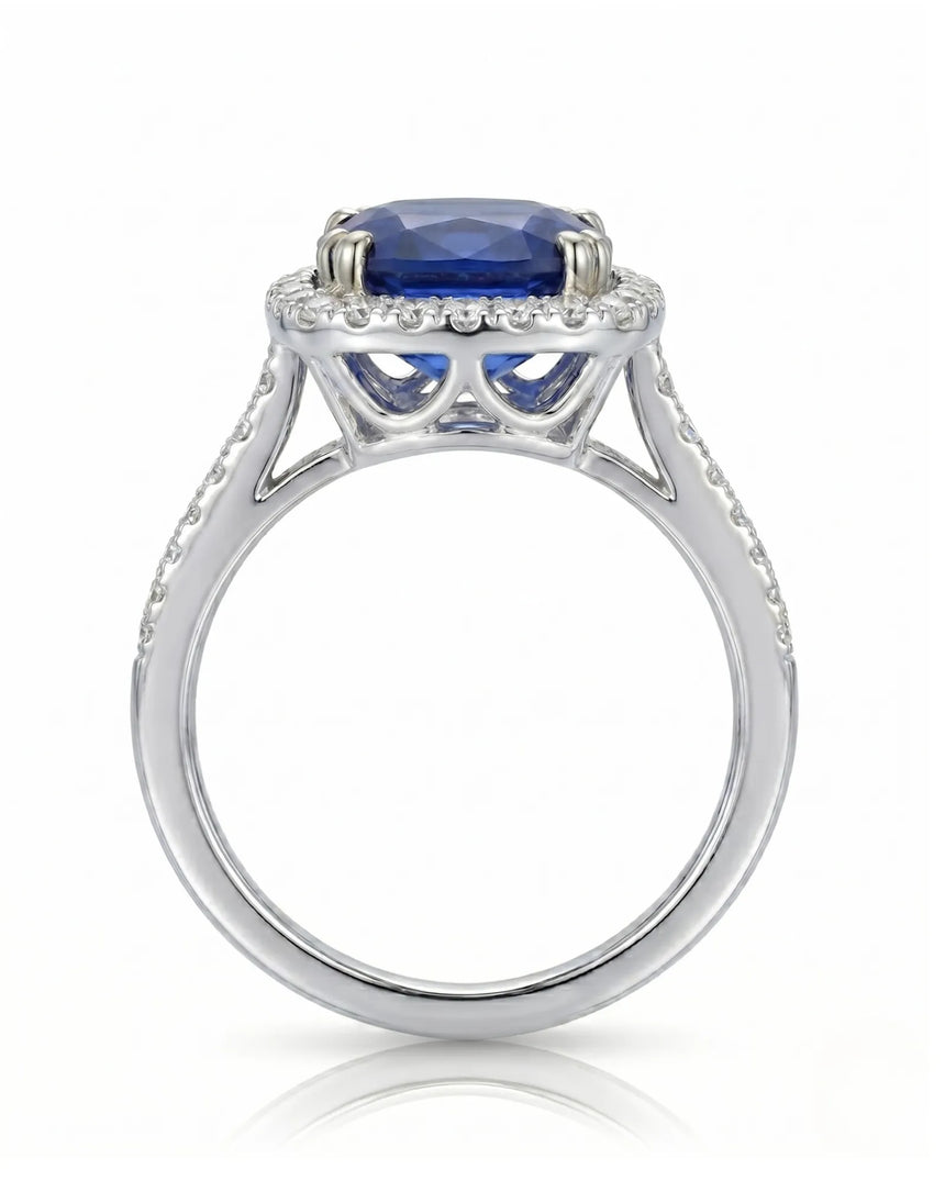 Sapphire and diamond engagement ring with classic halo design in 18K white gold | SARATTI