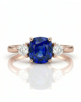 Sapphire and diamond engagement ring with classic three-stone design in rose gold | SARATTI