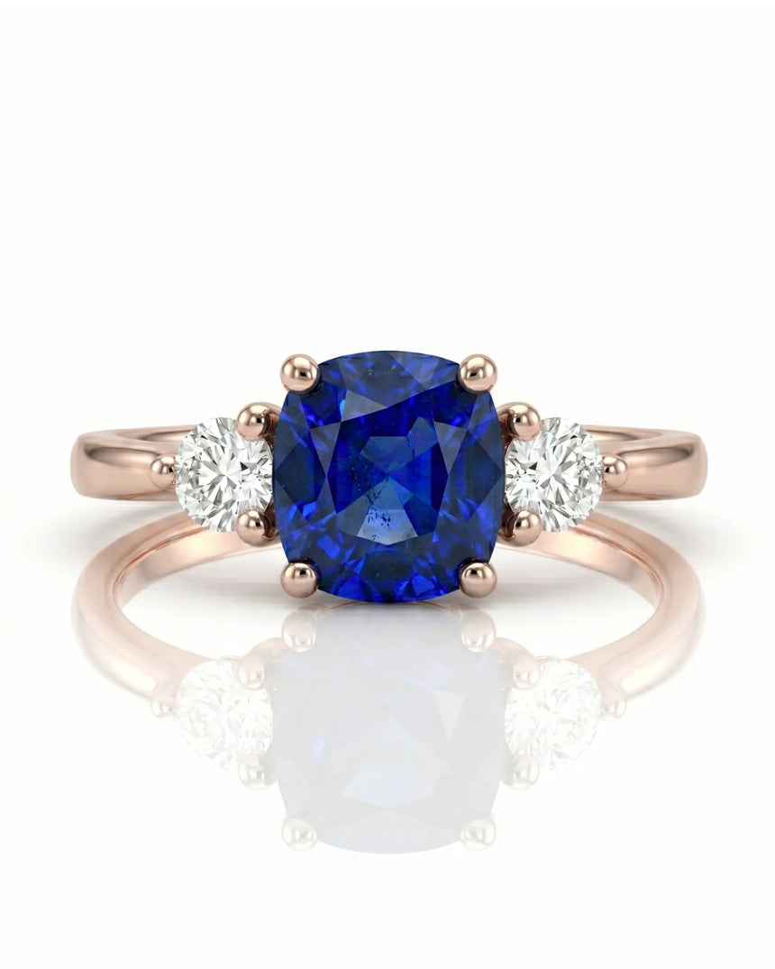Sapphire and diamond engagement ring with classic three-stone design in rose gold | SARATTI