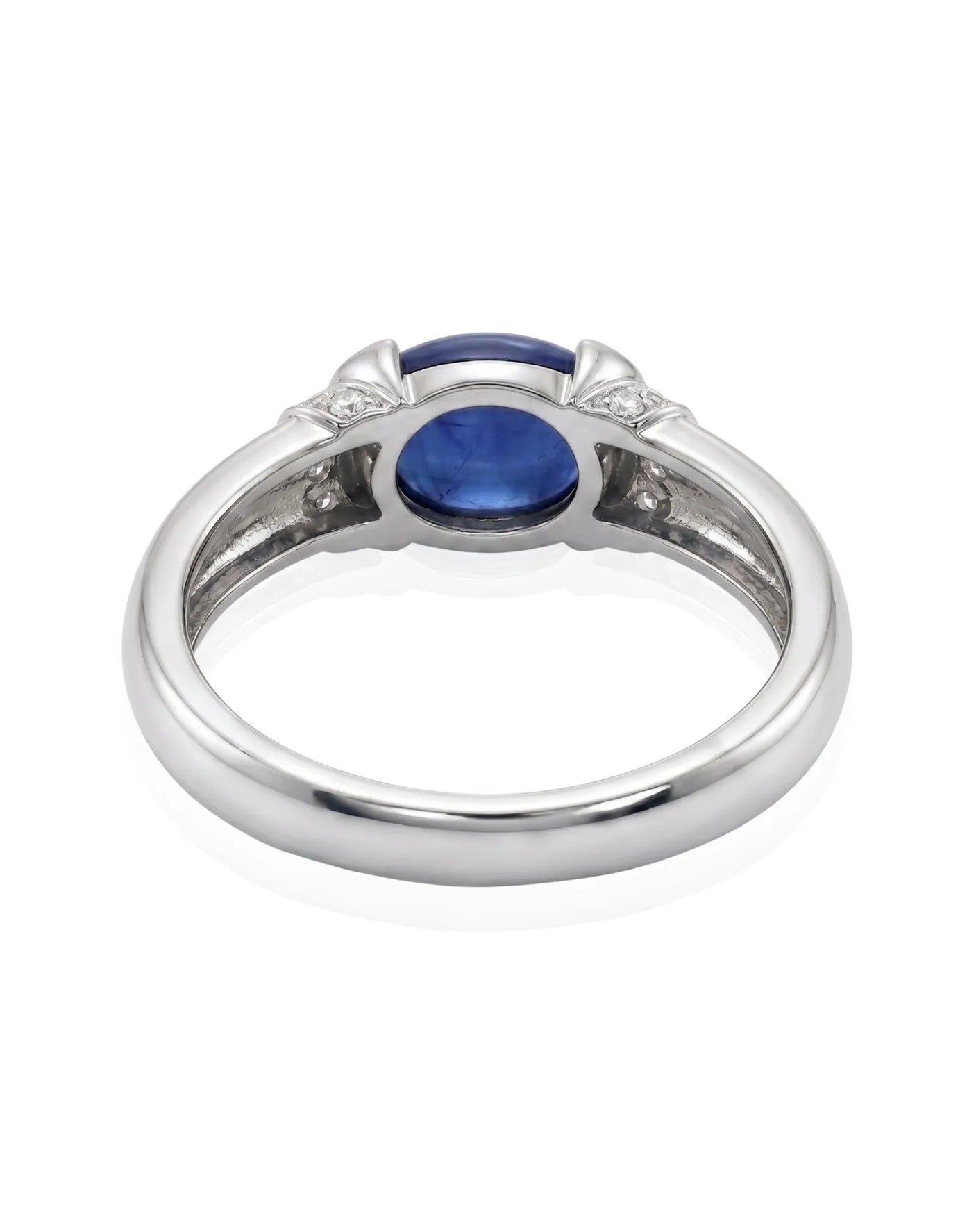 Sapphire and diamond engagement ring with clean tension setting in 18K white gold | SARATTI