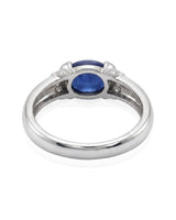 Sapphire and diamond engagement ring with clean tension setting in 18K white gold | SARATTI