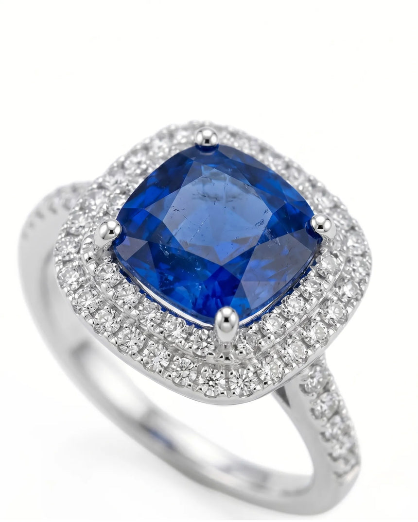 Sapphire and diamond engagement ring with double halo design in platinum | SARATTI