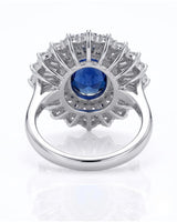 Sapphire and diamond engagement ring with dramatic halo in 18K white gold | SARATTI