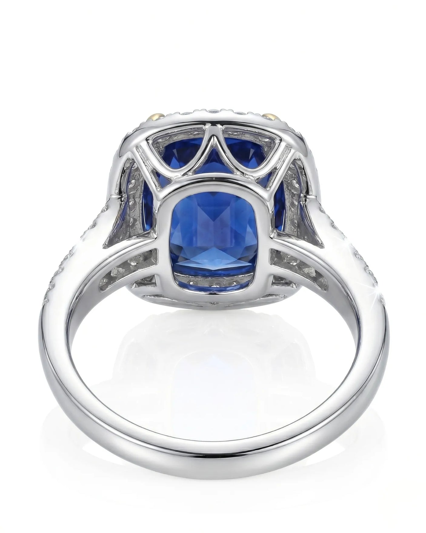Sapphire and diamond engagement ring with elegant halo design in platinum | SARATTI