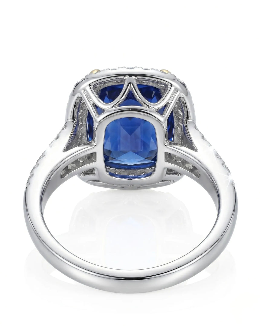 Sapphire and diamond engagement ring with elegant halo design in platinum | SARATTI