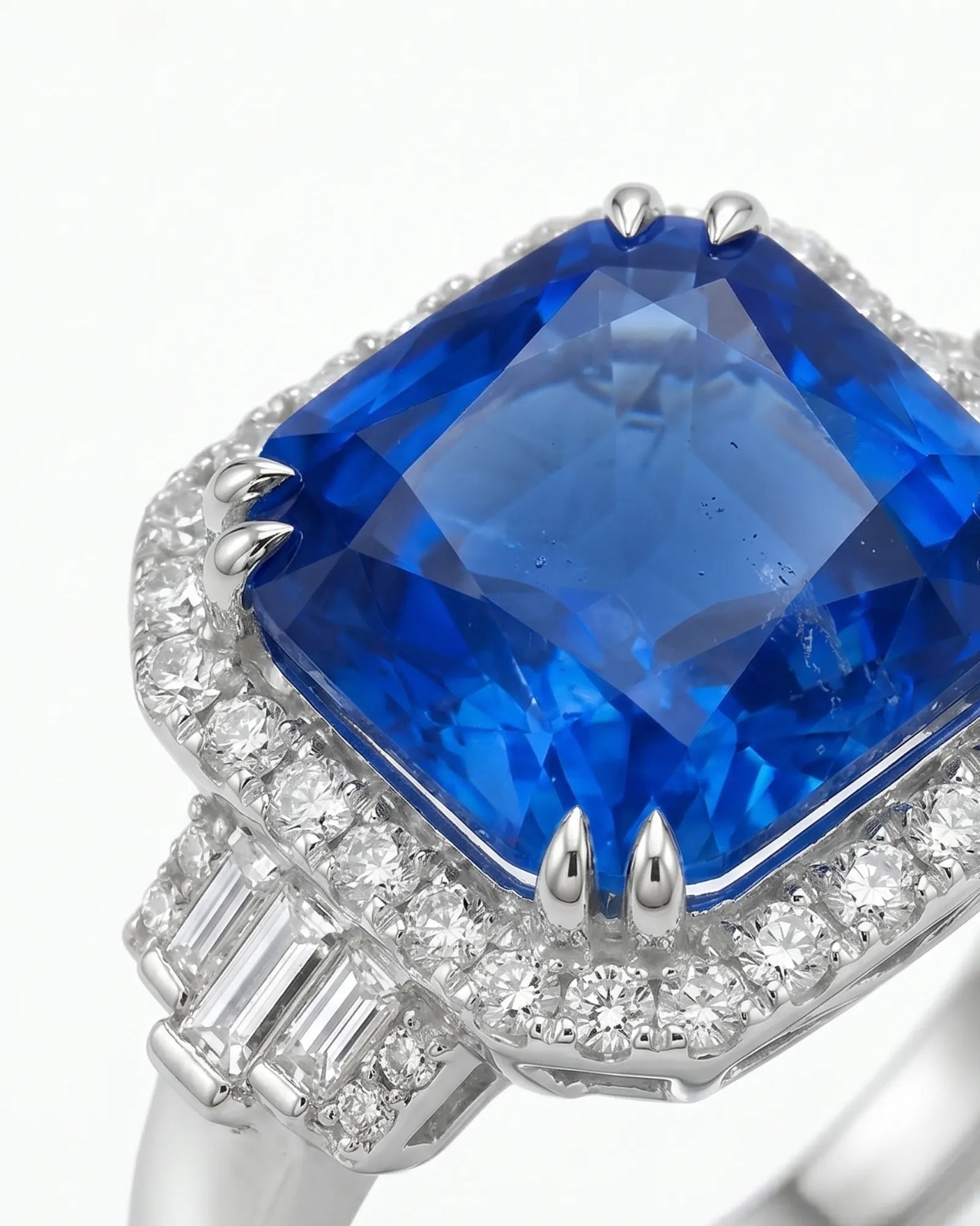 Sapphire and diamond engagement ring with heirloom halo design in platinum | SARATTI