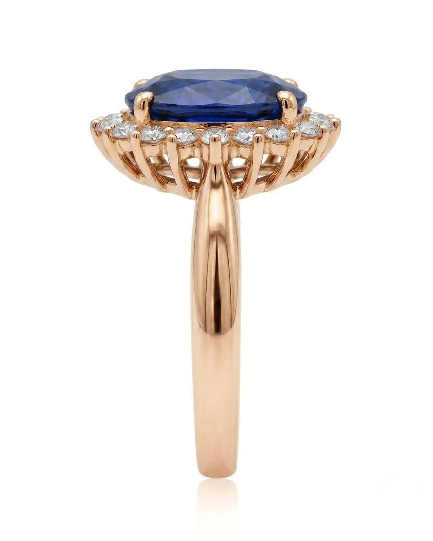 Sapphire and diamond engagement ring with royal halo design in rose gold | SARATTI