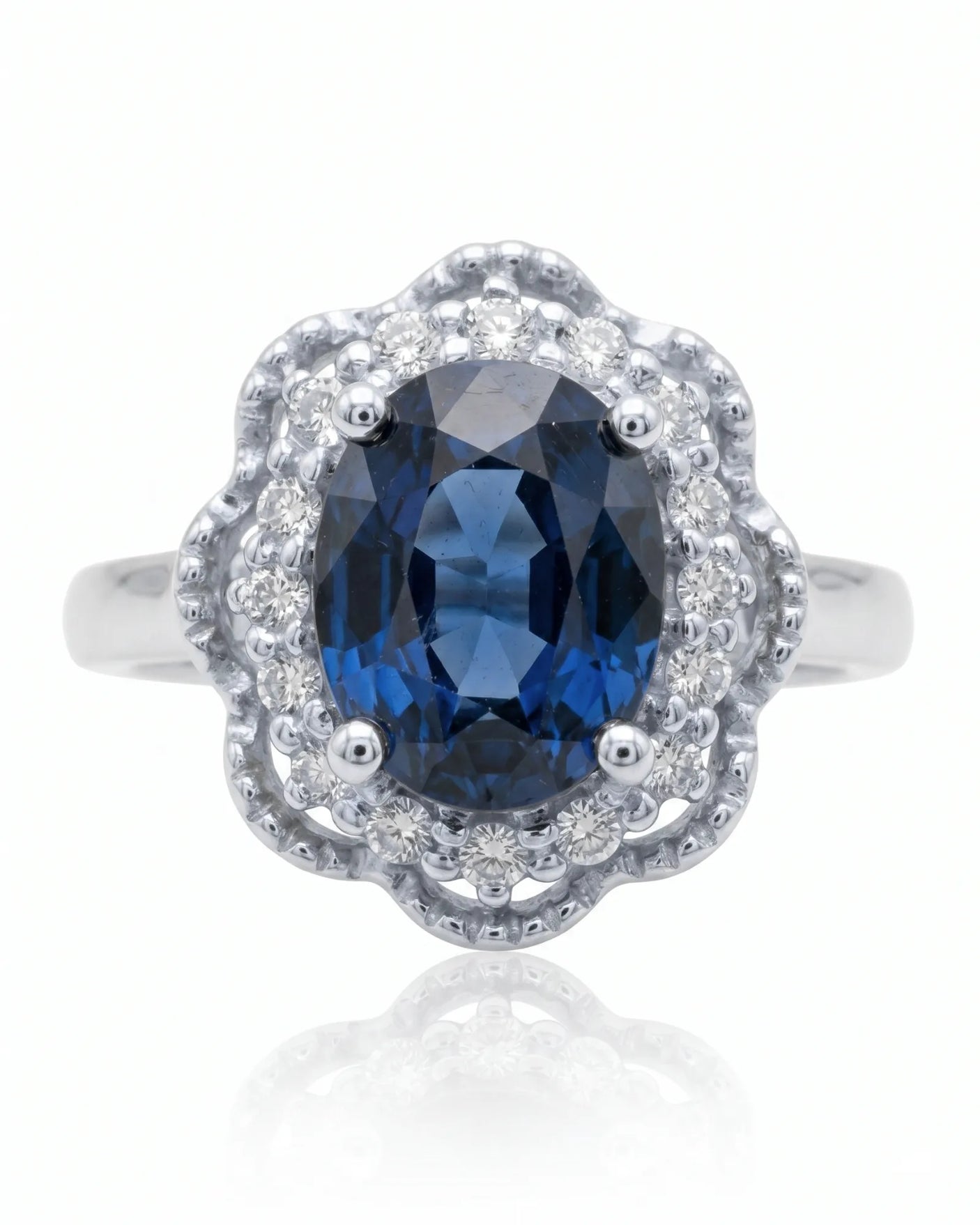 Sapphire and diamond engagement ring with scalloped halo design in platinum - SARATTI