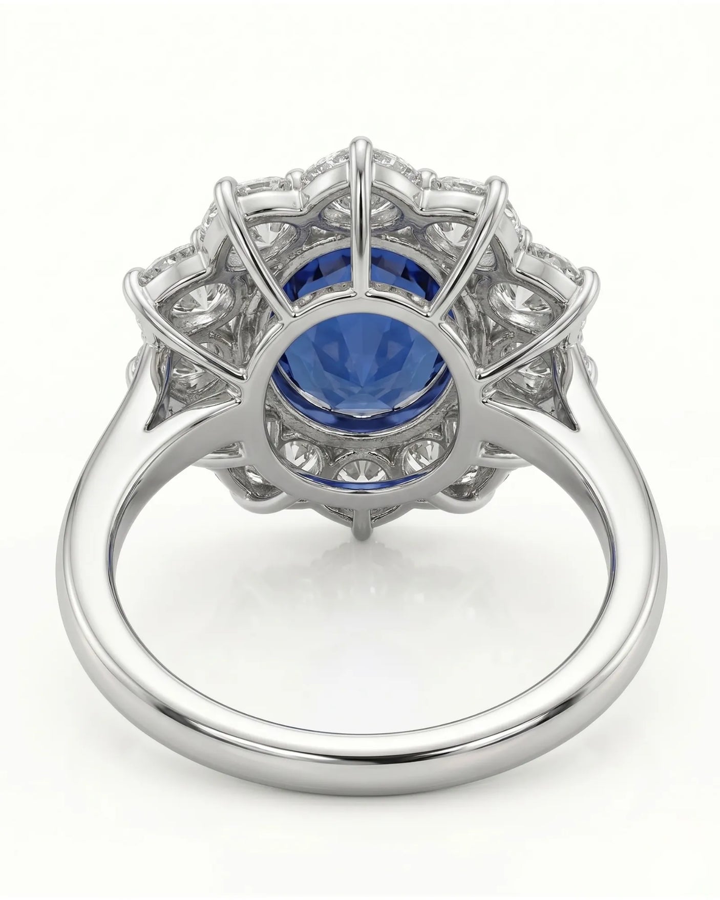 Sapphire and diamond engagement ring with scalloped halo design in platinum | SARATTI