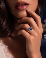 Sapphire and diamond gift ring with elegant halo design in 18K yellow gold | SARATTI