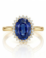 Sapphire promise ring for meaningful gifting with diamond halo in yellow gold | SARATTI