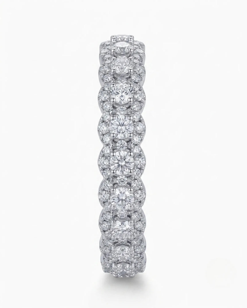Scalloped platinum wedding band with round diamonds and brilliant accent diamond detailing | SARATTI