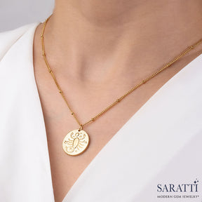 Scorpio Medallion on Woman in 18K Yellow Gold | Saratti