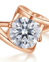 Sculptural Möbius moissanite ring with flowing open band and heart gallery in 18K rose gold | SARATTI