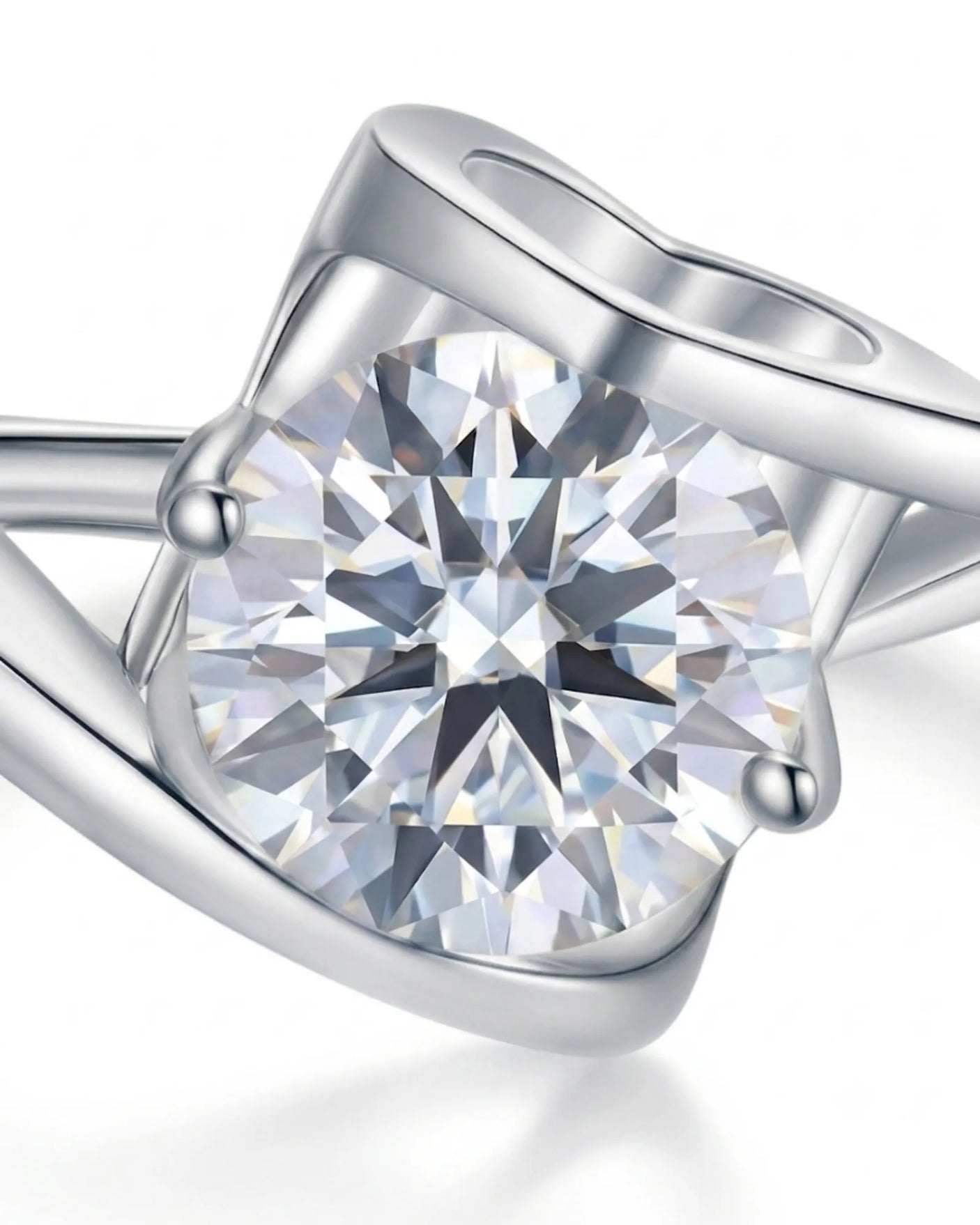 Sculptural Möbius moissanite ring with flowing open band and heart gallery in polished platinum | SARATTI