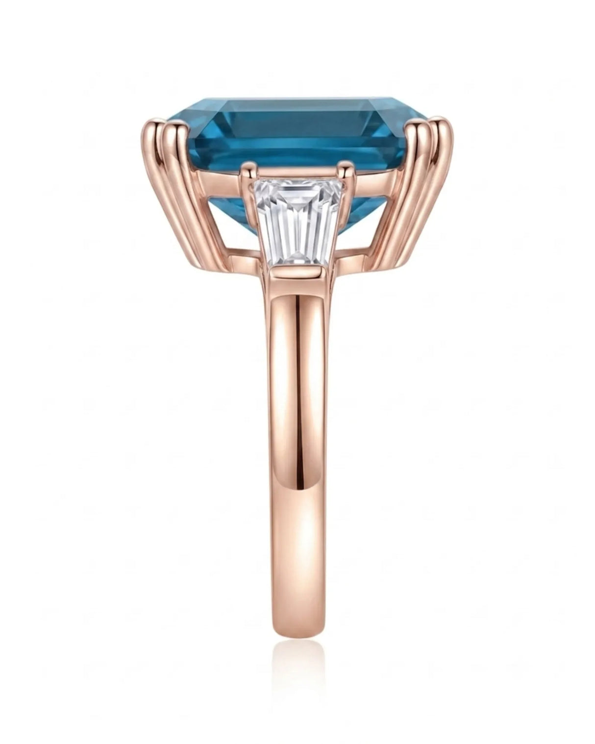 Sculptural blue topaz ring with double-claw corners and geometric diamond sides in 18K rose gold | SARATTI