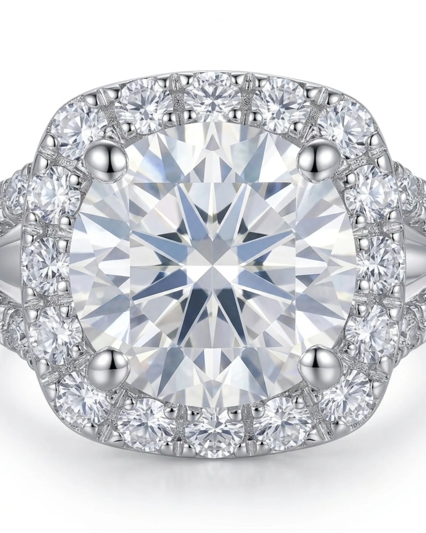 Sculptural cushion halo moissanite ring with open split shoulders crafted in enduring platinum | SARATTI