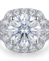Sculptural cushion halo moissanite ring with open split shoulders crafted in enduring platinum | SARATTI