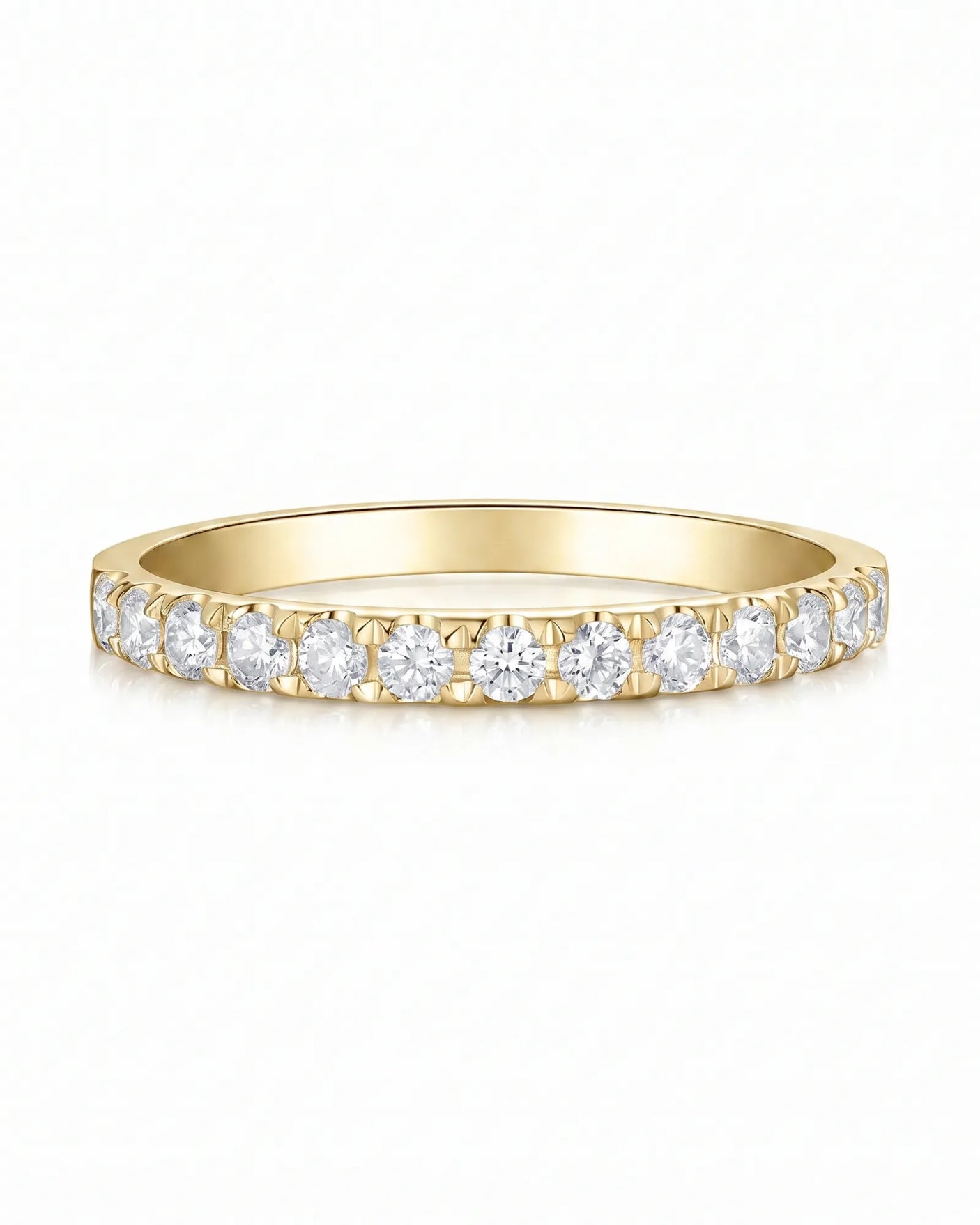 Sculptural infinity wedding ring with intertwined curves and diamond accents in rich 18K yellow gold | SARATTI