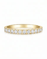 Sculptural infinity wedding ring with intertwined curves and diamond accents in rich 18K yellow gold | SARATTI