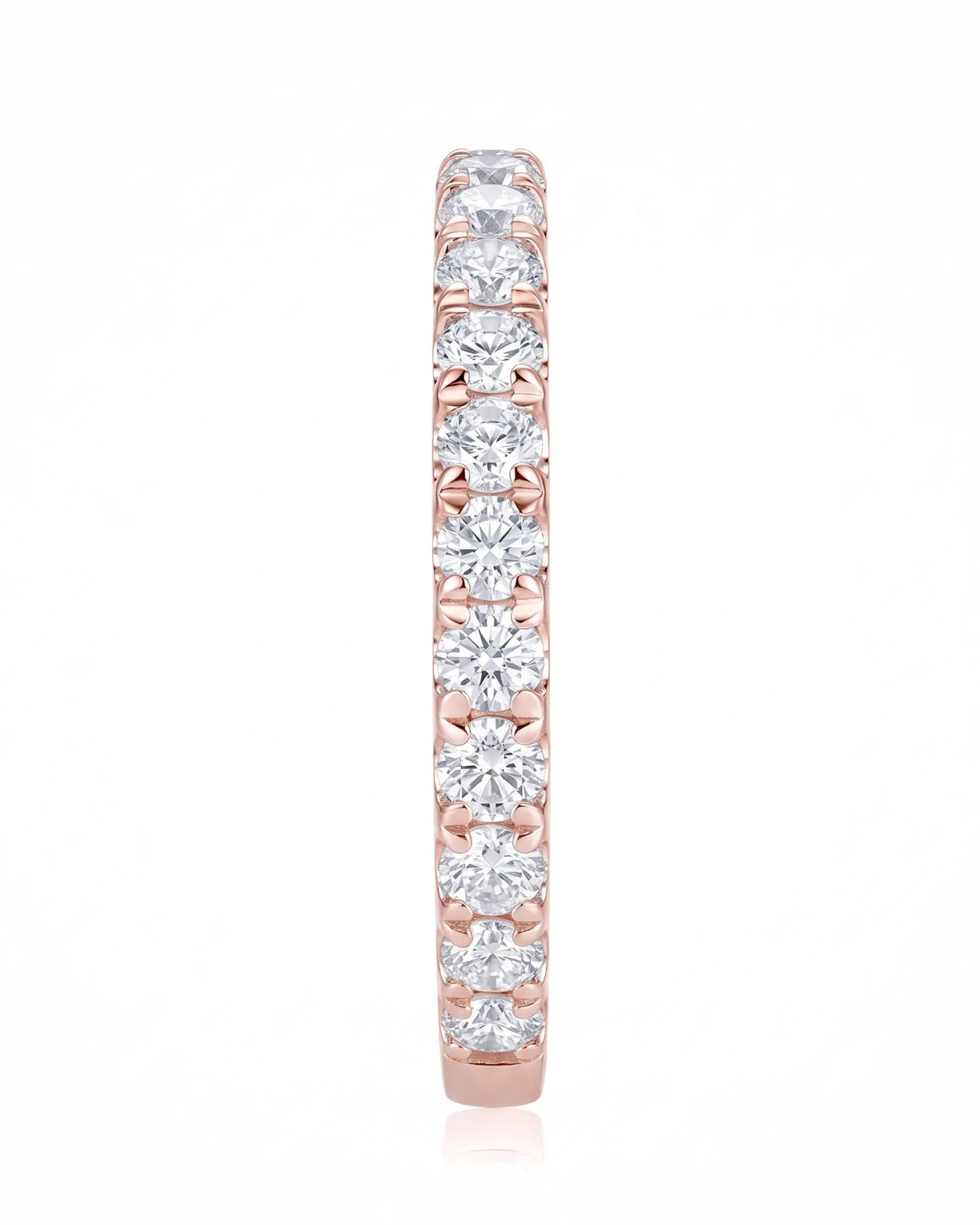 Sculptural infinity wedding ring with intertwined curves and diamond accents in warm 18K rose gold | SARATTI