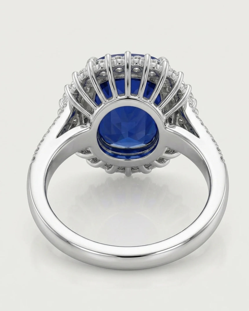 Sculptural platinum sapphire ring featuring fan set baguette diamonds and brilliant round accents - SARATTI