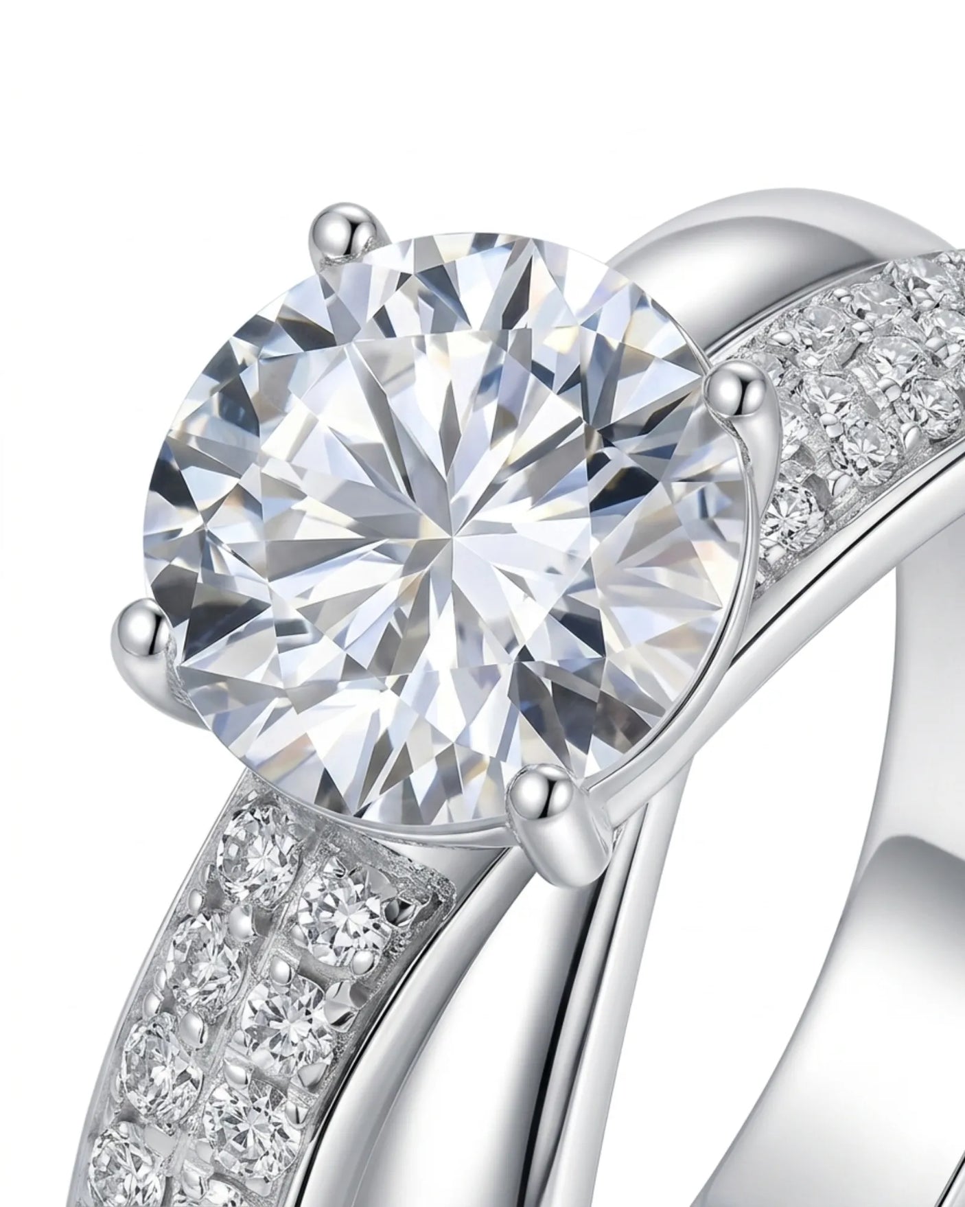 Sculptural split shank moissanite ring with polished ribbon and pavé detailing crafted in platinum | SARATTI