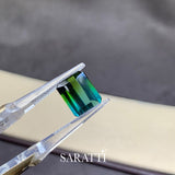 Side profile emerald cut bi-color tourmaline 9 × 11.3 mm | SARATTI